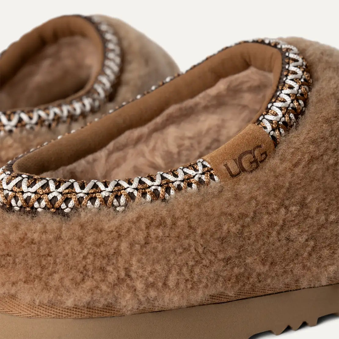 UGG- WOMEN’S TASMAN MAXI CURLY SLIP ON