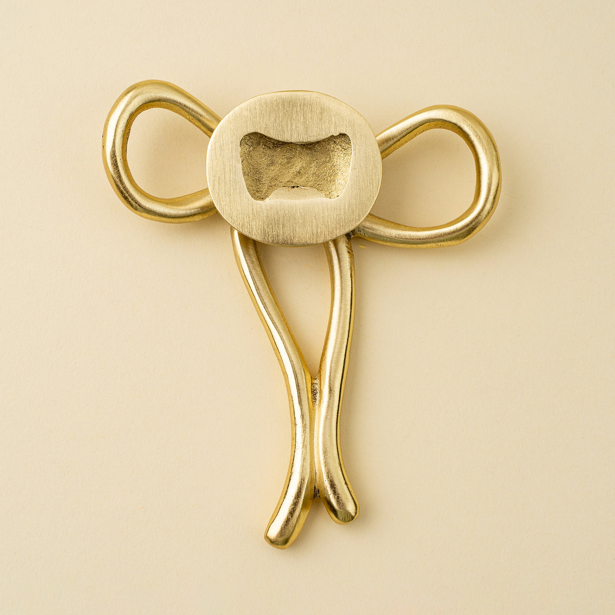 INDABA - BRASS BOW BOTTLE OPENER