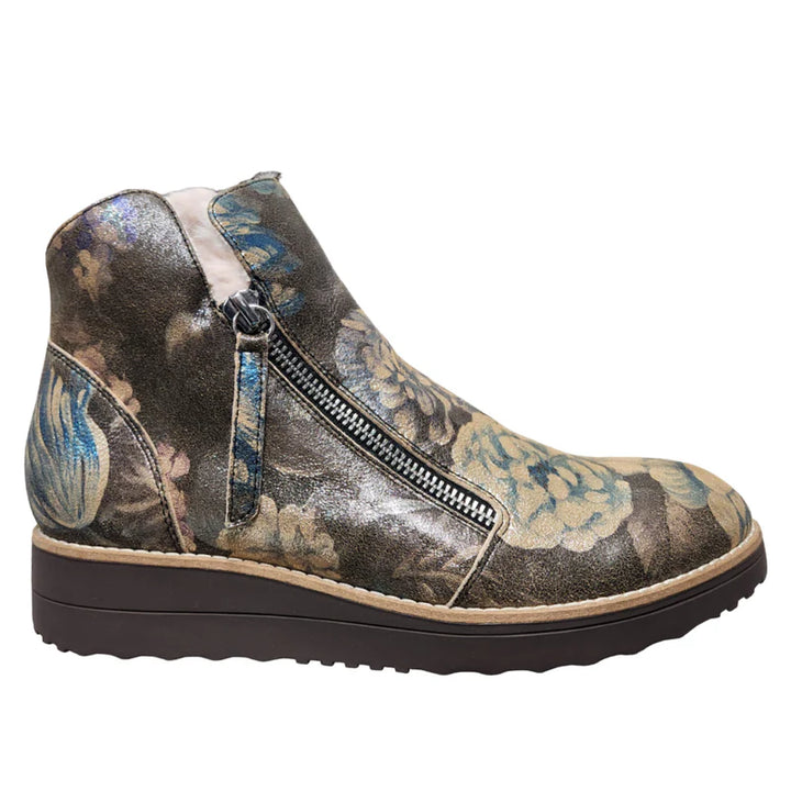 Floral patterned ankle boot with a zipper on a white background