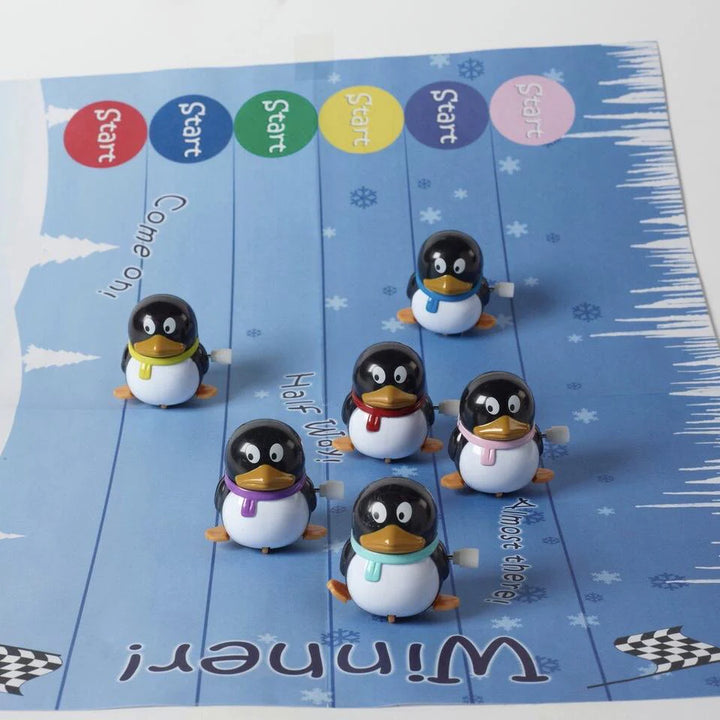ROBIN REED- RACING PENGUIN CHRISTMAS CRACKERS